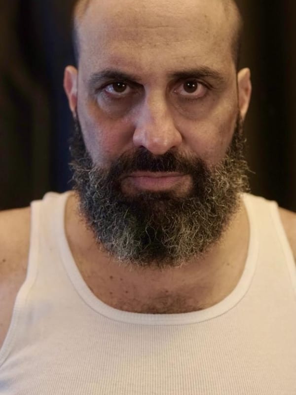 Philip Galinsky headshot in white shirt