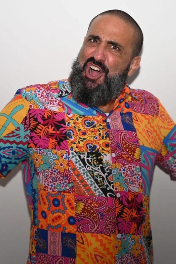 Philip Galinsky in colorful patterned shirt