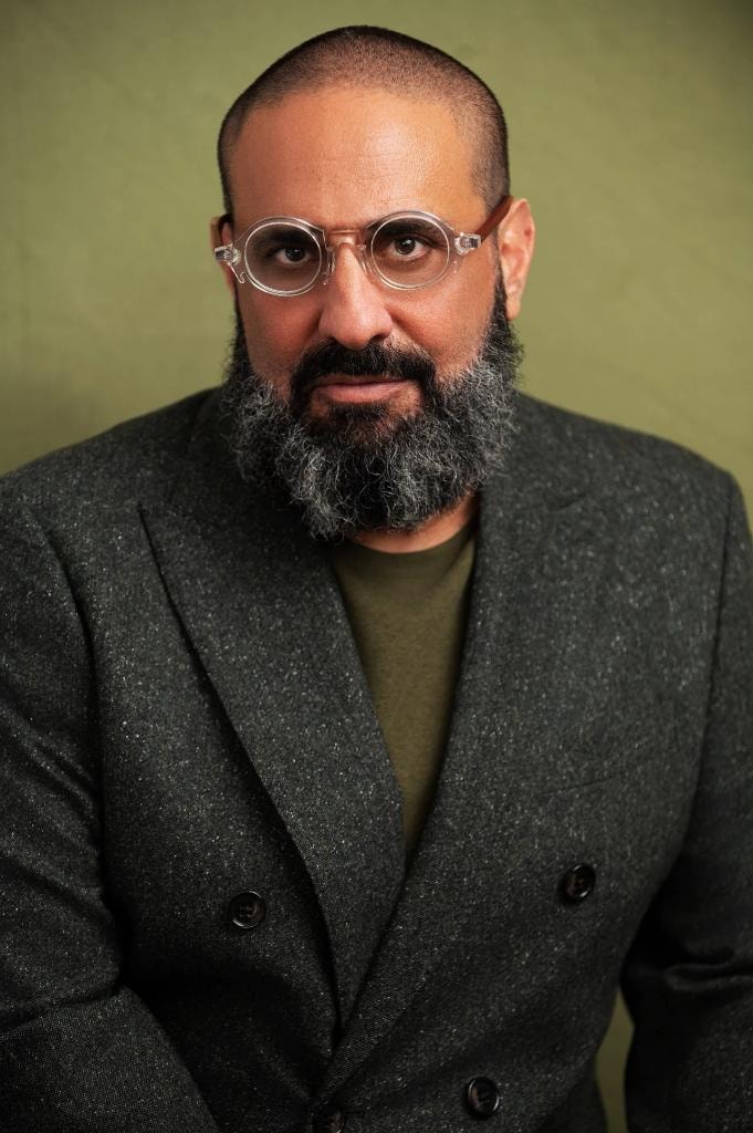 Philip Galinsky with round glasses portrait